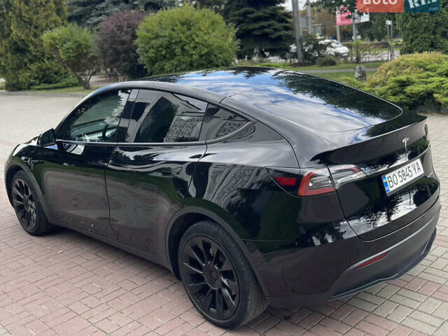 Черный Тесла Model Y, объемом двигателя 0 л и пробегом 89 тыс. км за 26999 $, фото 26 на Automoto.ua