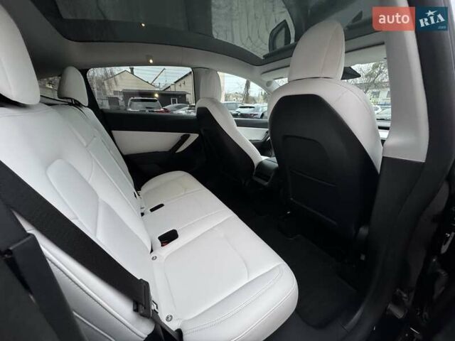 Черный Тесла Model Y, объемом двигателя 0 л и пробегом 45 тыс. км за 25999 $, фото 22 на Automoto.ua