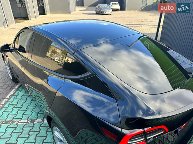 Черный Тесла Model Y, объемом двигателя 0 л и пробегом 136 тыс. км за 26199 $, фото 25 на Automoto.ua