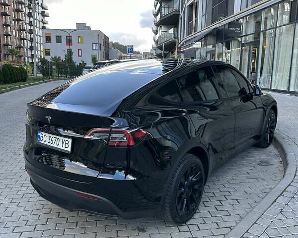 Черный Тесла Model Y, объемом двигателя 0 л и пробегом 11 тыс. км за 30300 $, фото 1 на Automoto.ua