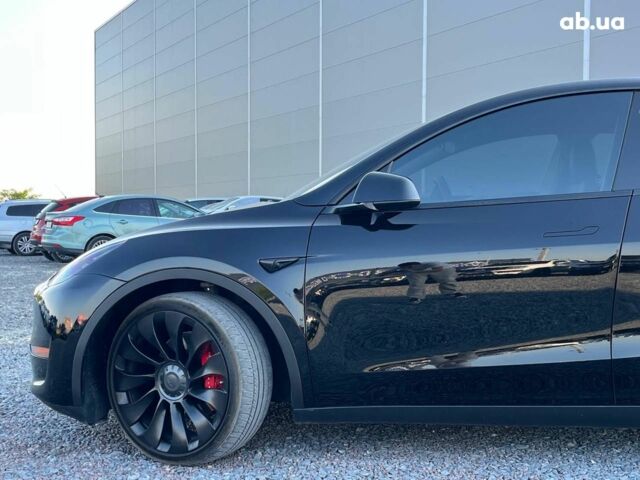 Черный Тесла Model Y, объемом двигателя 0 л и пробегом 73 тыс. км за 27890 $, фото 11 на Automoto.ua