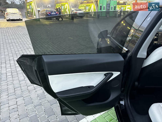 Черный Тесла Model Y, объемом двигателя 0 л и пробегом 85 тыс. км за 28000 $, фото 25 на Automoto.ua