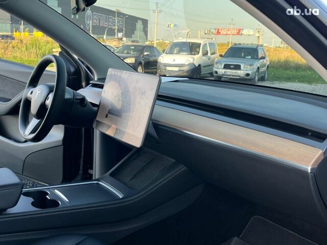 Черный Тесла Model Y, объемом двигателя 0 л и пробегом 73 тыс. км за 27890 $, фото 37 на Automoto.ua