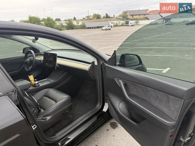 Черный Тесла Model Y, объемом двигателя 0 л и пробегом 65 тыс. км за 27000 $, фото 13 на Automoto.ua