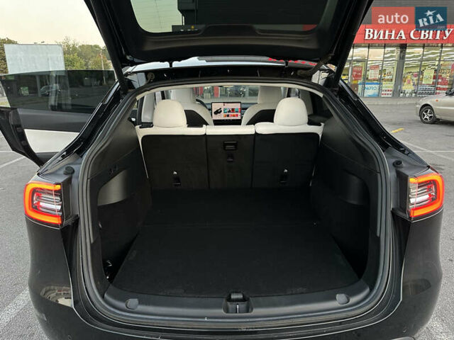 Чорний Тесла Model Y, об'ємом двигуна 0 л та пробігом 135 тис. км за 26499 $, фото 44 на Automoto.ua