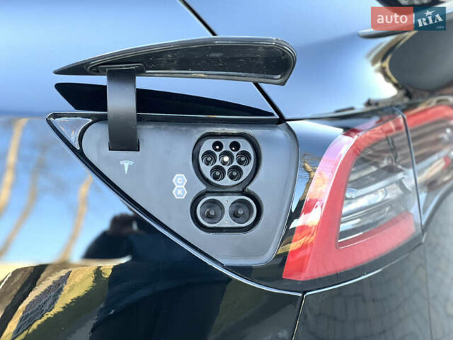 Черный Тесла Model Y, объемом двигателя 0 л и пробегом 100 тыс. км за 28900 $, фото 37 на Automoto.ua