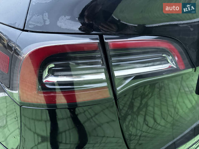 Черный Тесла Model Y, объемом двигателя 0 л и пробегом 85 тыс. км за 28000 $, фото 49 на Automoto.ua