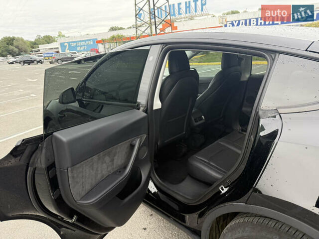 Черный Тесла Model Y, объемом двигателя 0 л и пробегом 65 тыс. км за 27000 $, фото 8 на Automoto.ua