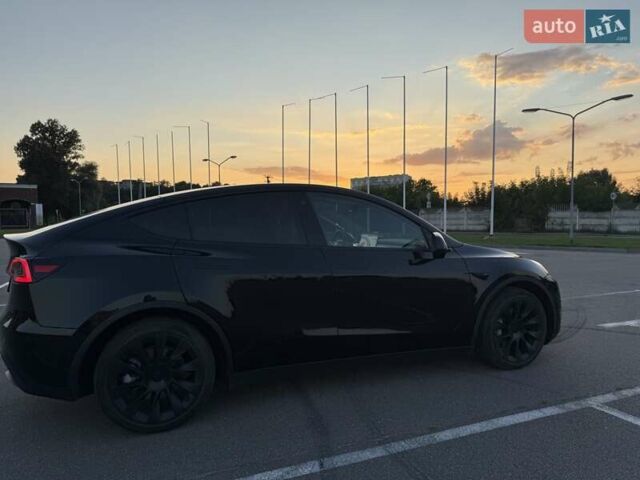 Черный Тесла Model Y, объемом двигателя 0 л и пробегом 42 тыс. км за 28900 $, фото 1 на Automoto.ua