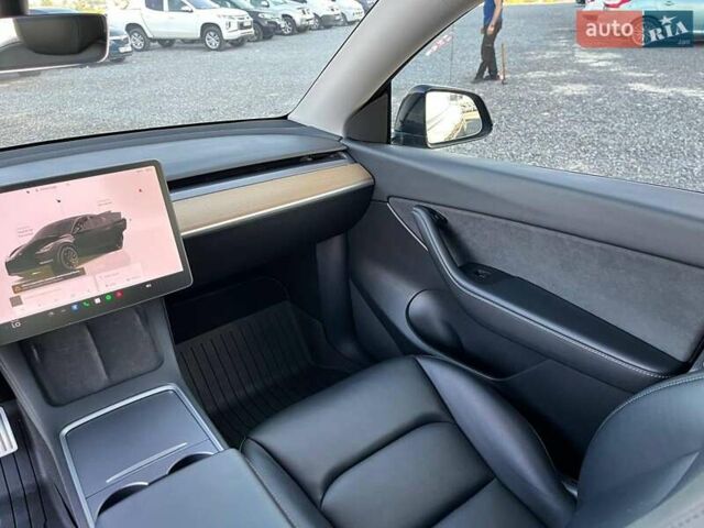 Черный Тесла Model Y, объемом двигателя 0 л и пробегом 73 тыс. км за 27890 $, фото 30 на Automoto.ua