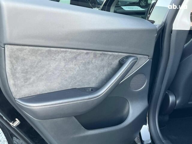Черный Тесла Model Y, объемом двигателя 0 л и пробегом 73 тыс. км за 27890 $, фото 25 на Automoto.ua