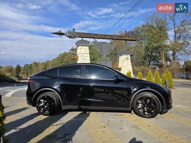 Черный Тесла Model Y, объемом двигателя 0 л и пробегом 27 тыс. км за 28999 $, фото 4 на Automoto.ua