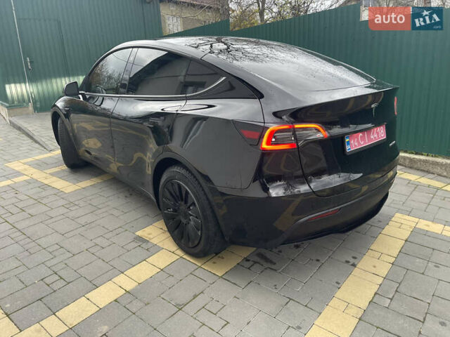 Черный Тесла Model Y, объемом двигателя 0 л и пробегом 67 тыс. км за 27500 $, фото 50 на Automoto.ua
