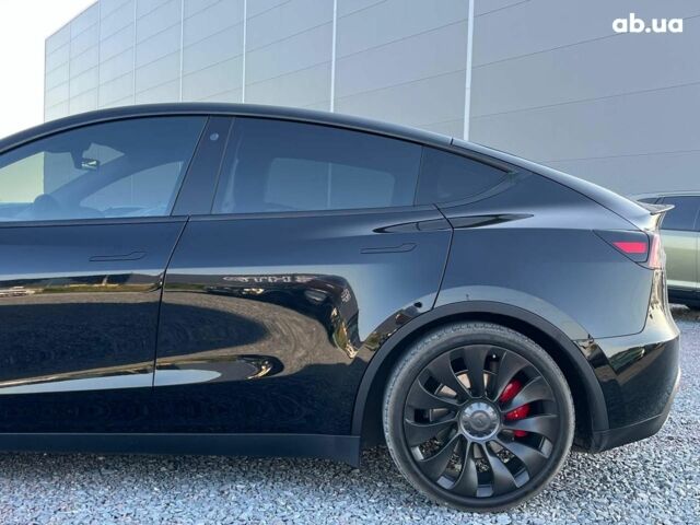 Черный Тесла Model Y, объемом двигателя 0 л и пробегом 73 тыс. км за 27890 $, фото 9 на Automoto.ua