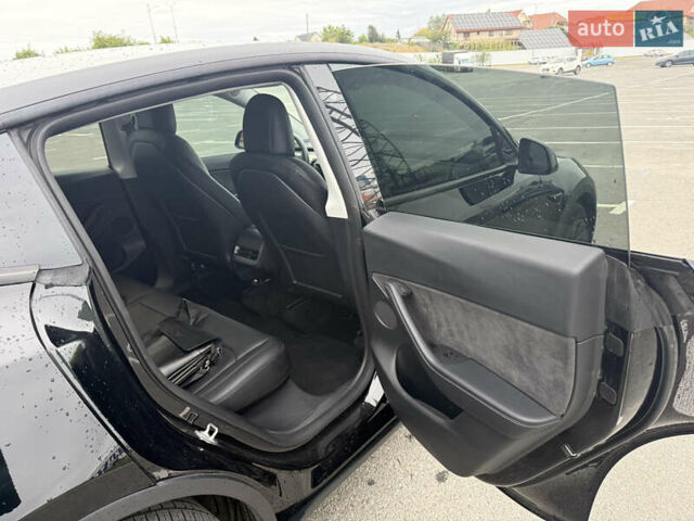 Черный Тесла Model Y, объемом двигателя 0 л и пробегом 65 тыс. км за 27000 $, фото 12 на Automoto.ua
