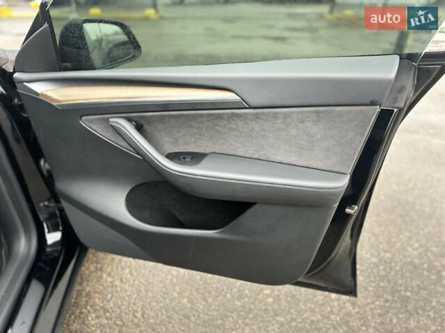 Чорний Тесла Model Y, об'ємом двигуна 0 л та пробігом 27 тис. км за 28900 $, фото 23 на Automoto.ua