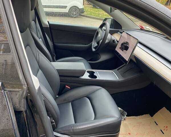 Черный Тесла Model Y, объемом двигателя 0 л и пробегом 32 тыс. км за 32000 $, фото 1 на Automoto.ua