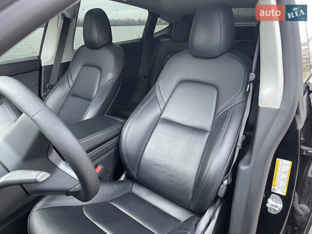 Черный Тесла Model Y, объемом двигателя 0 л и пробегом 88 тыс. км за 33000 $, фото 13 на Automoto.ua