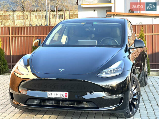 Черный Тесла Model Y, объемом двигателя 0 л и пробегом 100 тыс. км за 28900 $, фото 2 на Automoto.ua