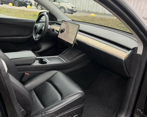 Черный Тесла Model Y, объемом двигателя 0 л и пробегом 61 тыс. км за 22900 $, фото 27 на Automoto.ua