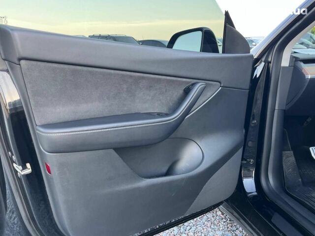 Черный Тесла Model Y, объемом двигателя 0 л и пробегом 73 тыс. км за 27890 $, фото 16 на Automoto.ua