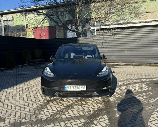 Черный Тесла Model Y, объемом двигателя 0 л и пробегом 51 тыс. км за 23200 $, фото 1 на Automoto.ua