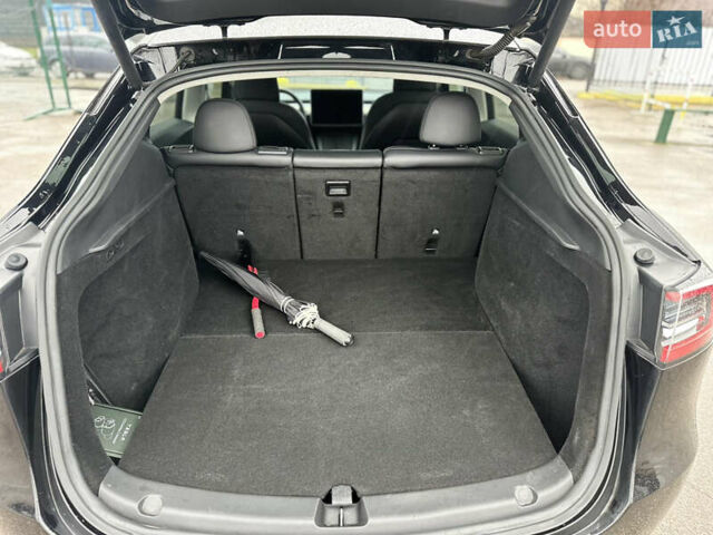 Чорний Тесла Model Y, об'ємом двигуна 0 л та пробігом 27 тис. км за 28900 $, фото 17 на Automoto.ua