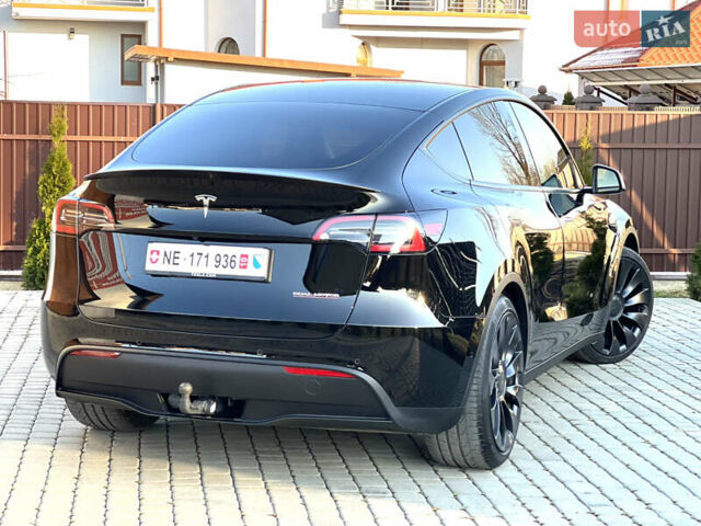 Черный Тесла Model Y, объемом двигателя 0 л и пробегом 100 тыс. км за 28900 $, фото 21 на Automoto.ua