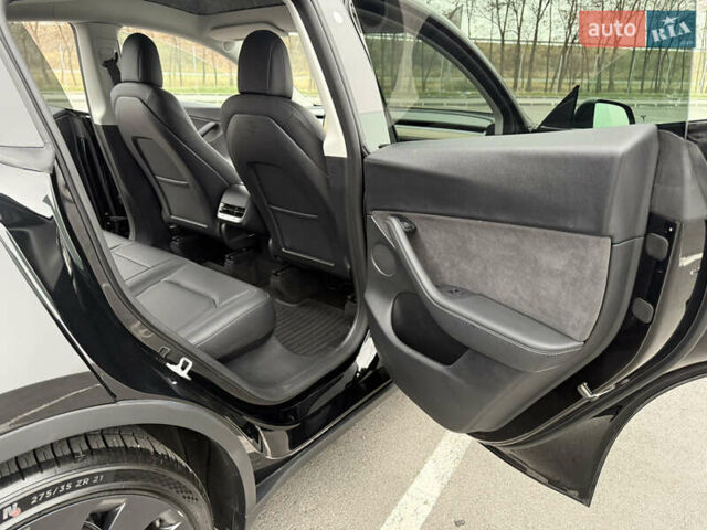 Черный Тесла Model Y, объемом двигателя 0 л и пробегом 22 тыс. км за 27999 $, фото 26 на Automoto.ua