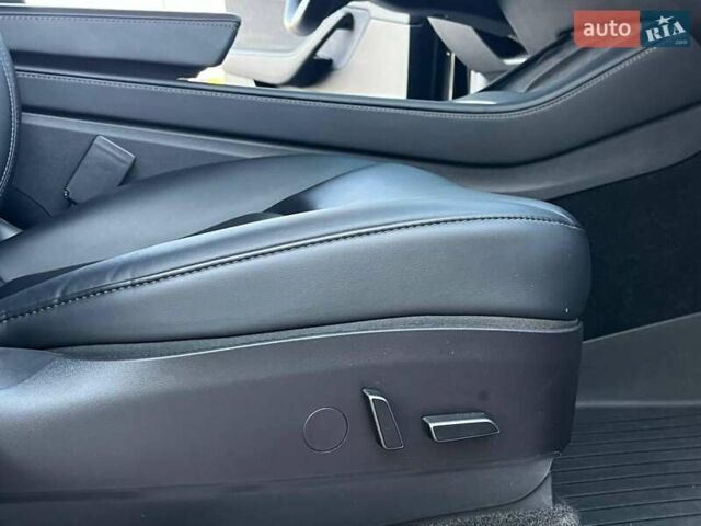 Черный Тесла Model Y, объемом двигателя 0 л и пробегом 73 тыс. км за 27890 $, фото 39 на Automoto.ua