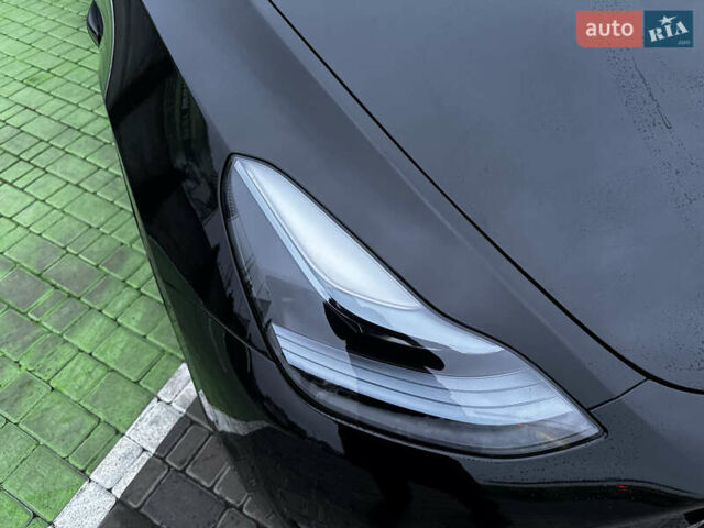 Черный Тесла Model Y, объемом двигателя 0 л и пробегом 85 тыс. км за 28000 $, фото 43 на Automoto.ua