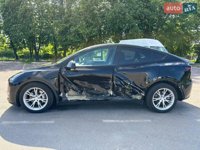 Тесла Model Y 2022 в Ровно на Automoto.ua Черный Тесла Model Y, объемом двигателя 0 л и пробегом 51 тыс. км за 23699 $, фото 4 на Automoto.ua