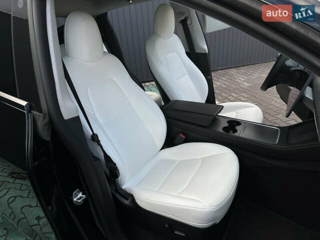 Черный Тесла Model Y, объемом двигателя 0 л и пробегом 136 тыс. км за 26199 $, фото 55 на Automoto.ua
