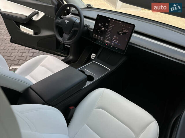 Черный Тесла Model Y, объемом двигателя 0 л и пробегом 136 тыс. км за 26199 $, фото 54 на Automoto.ua