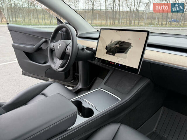 Черный Тесла Model Y, объемом двигателя 0 л и пробегом 22 тыс. км за 27999 $, фото 32 на Automoto.ua