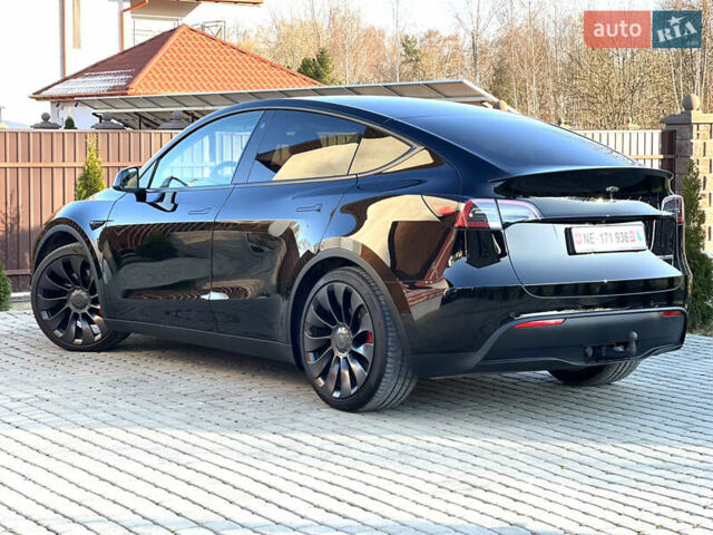 Черный Тесла Model Y, объемом двигателя 0 л и пробегом 100 тыс. км за 28900 $, фото 17 на Automoto.ua