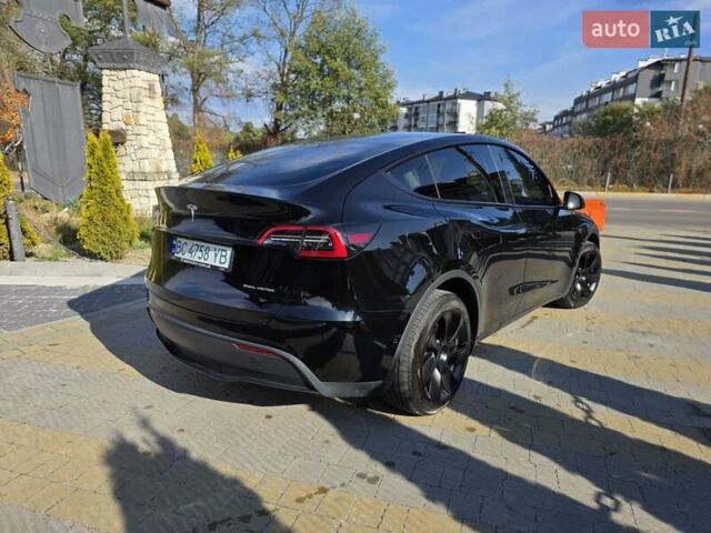 Черный Тесла Model Y, объемом двигателя 0 л и пробегом 27 тыс. км за 28999 $, фото 3 на Automoto.ua