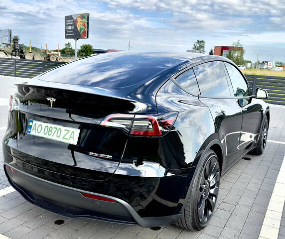 Черный Тесла Model Y, объемом двигателя 0 л и пробегом 22 тыс. км за 58000 $, фото 2 на Automoto.ua