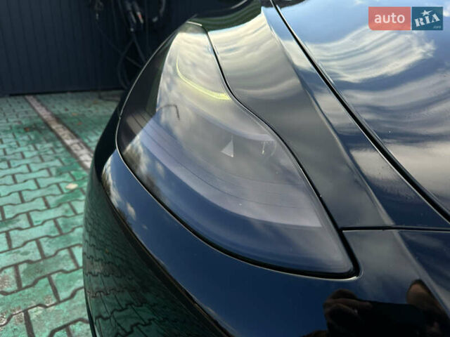 Черный Тесла Model Y, объемом двигателя 0 л и пробегом 136 тыс. км за 26199 $, фото 28 на Automoto.ua