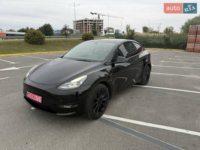 Черный Тесла Model Y, объемом двигателя 0 л и пробегом 65 тыс. км за 27000 $, фото 1 на Automoto.ua