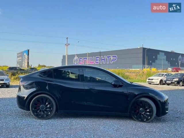 Черный Тесла Model Y, объемом двигателя 0 л и пробегом 73 тыс. км за 27890 $, фото 4 на Automoto.ua