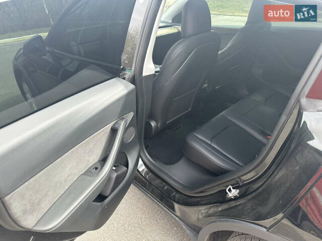 Черный Тесла Model Y, объемом двигателя 0 л и пробегом 24 тыс. км за 27999 $, фото 14 на Automoto.ua