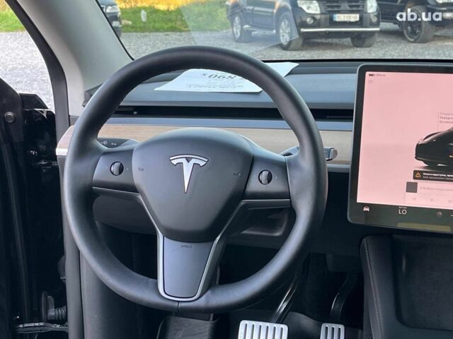 Черный Тесла Model Y, объемом двигателя 0 л и пробегом 73 тыс. км за 27890 $, фото 28 на Automoto.ua