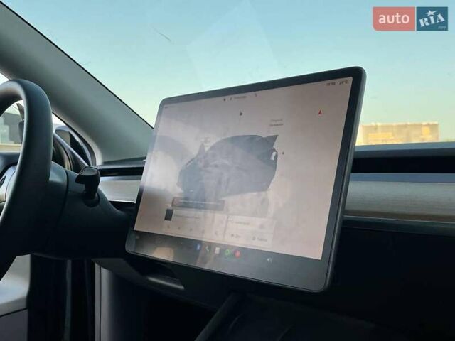 Черный Тесла Model Y, объемом двигателя 0 л и пробегом 73 тыс. км за 27890 $, фото 42 на Automoto.ua