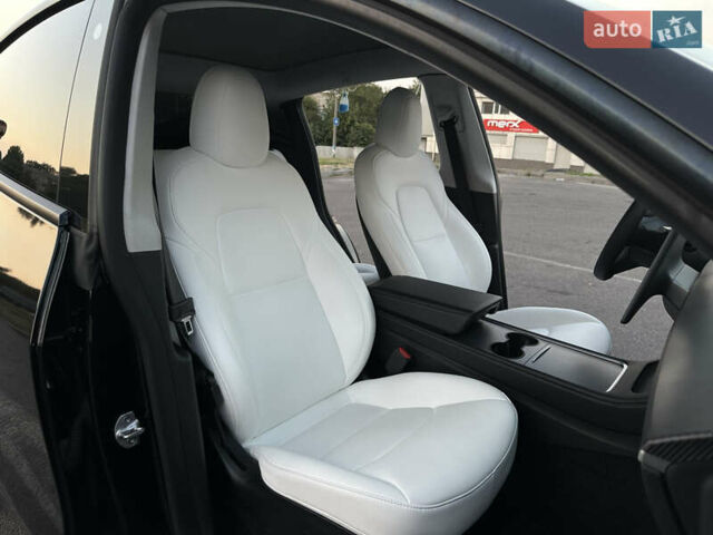 Чорний Тесла Model Y, об'ємом двигуна 0 л та пробігом 135 тис. км за 26499 $, фото 50 на Automoto.ua