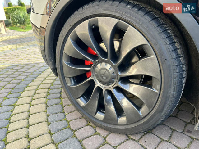 Тесла Model Y 2022 у Львові на Automoto.ua Чорний Тесла Model Y, об'ємом двигуна 0 л та пробігом 128 тис. км за 26300 $, фото 23 на Automoto.ua