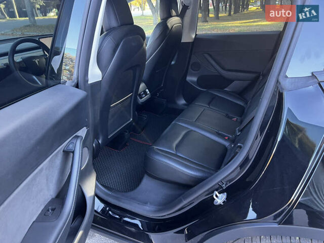 Черный Тесла Model Y, объемом двигателя 0 л и пробегом 83 тыс. км за 30000 $, фото 6 на Automoto.ua