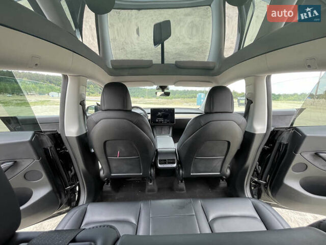 Черный Тесла Model Y, объемом двигателя 0 л и пробегом 83 тыс. км за 25500 $, фото 29 на Automoto.ua