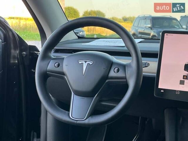 Черный Тесла Model Y, объемом двигателя 0 л и пробегом 73 тыс. км за 27890 $, фото 33 на Automoto.ua