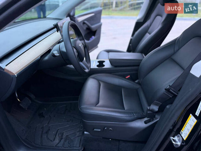 Черный Тесла Model Y, объемом двигателя 0 л и пробегом 53 тыс. км за 34999 $, фото 16 на Automoto.ua
